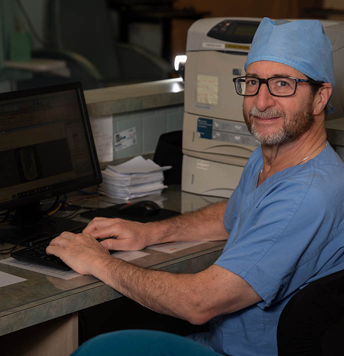 Dr. Daitch at Desk